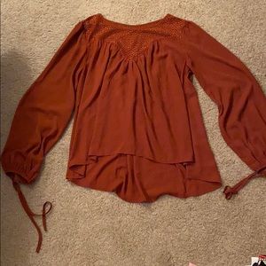 Rust color blouse